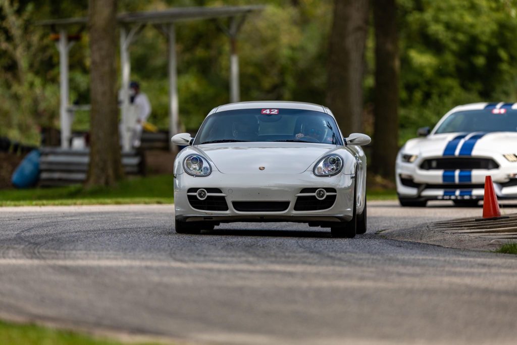 Porsche Cayman driving during a track day experience