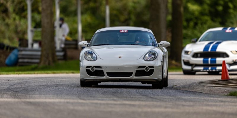 Porsche Cayman driving during a track day experience